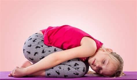 posizioni yoga bambini cane testa in giù