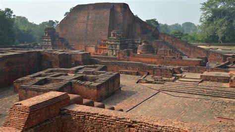 Nalanda university ruins and bodhisattva statues